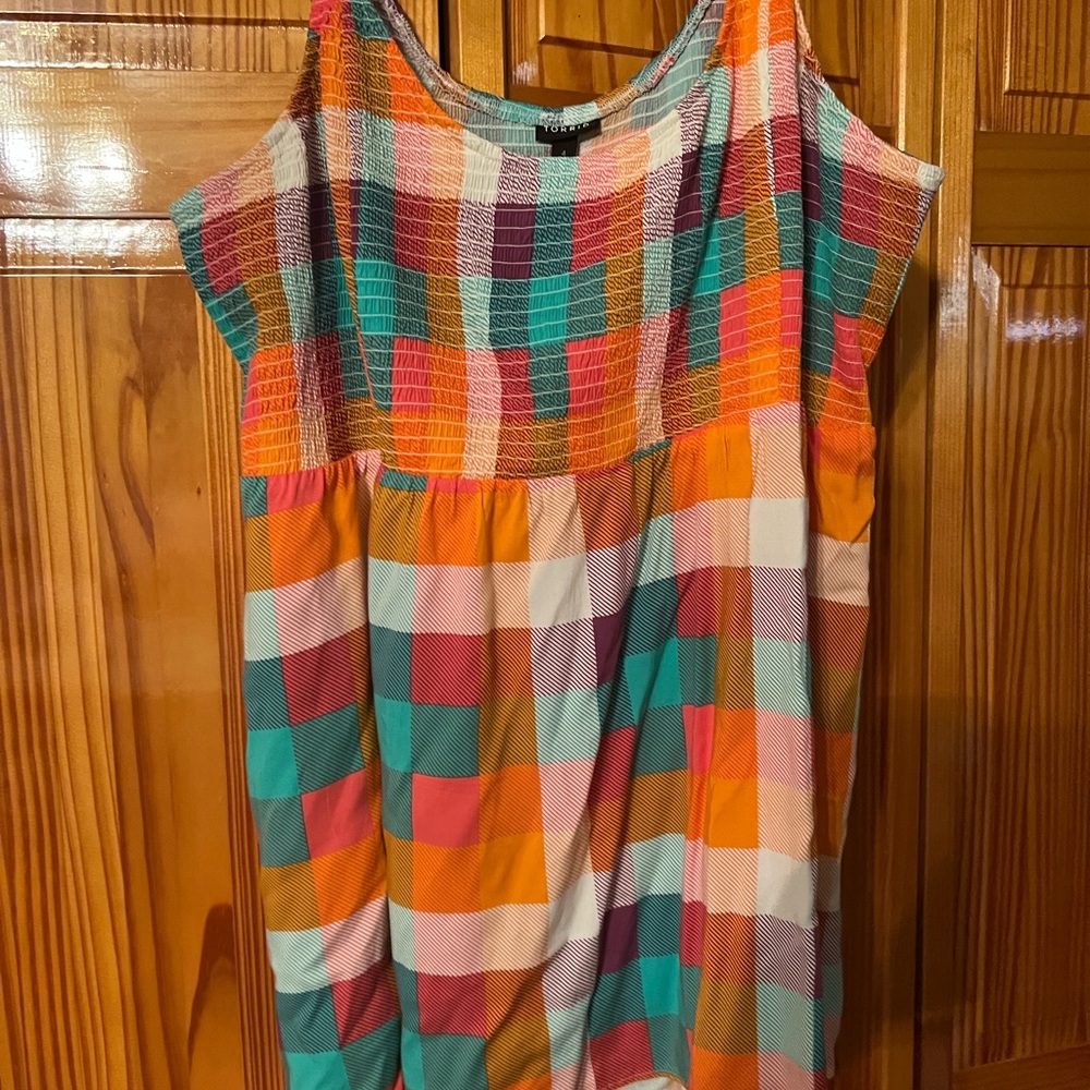 Torrid sleeveless blouse.